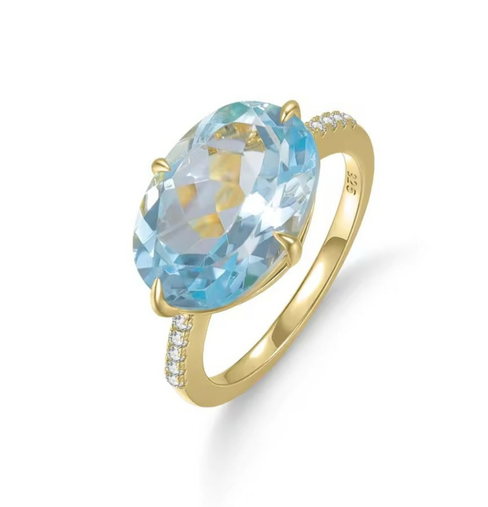 Tranquil Sky Blue Topaz Solitaire Ring